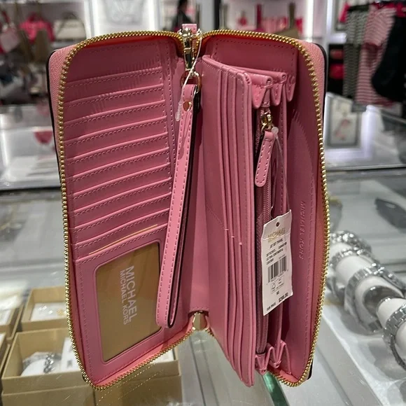 MICHAEL KORS JST 
Leather Continental Wristlet Phone Case Wallet 
Carnation 
NWT - Picture 9 of 16